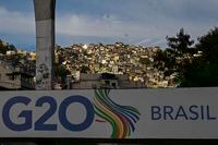 A G20 Brazil sign is set up in a brigde in front of Rocinha slum in Rio de Janeiro, Brazil, on February 15, 2024. On February 21 and 22, the first ministerial meeting of the Sherpa Track will be held in Rio de Janeiro. (Photo by Pablo PORCIUNCULA / AFP) (Photo by PABLO PORCIUNCULA/AFP via Getty Images)