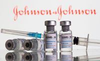 FILE PHOTO: Vials labelled "COVID-19 Coronavirus Vaccine" and syringe are seen in front of displayed Johnson & Johnson logo in this illustration taken, February 9, 2021. REUTERS/Dado Ruvic/Illustration/File Photo