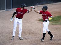 Collin Hysell congratulates Kyle Anderson after he scored a run during the Kamloops NorthPaws' home opener June 6, 2023 at Norbrock Stadium in Kamloops, B.C. The NorthPaws lost 11-4 to the Portland Pickles. Marissa Tiel/The Globe and Mail