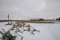 A memorial for those killed and injured in a deadly crash involving the Humboldt Broncos junior hockey team bus is visible at the intersection of Highways 35 and 335 near Tisdale, Sask., on Tuesday, Oct. 27, 2020. THE CANADIAN PRESS/Liam Richards