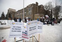 Teachers and support workers picket outside Northern Secondary School, in Toronto, in a Dec. 4, 2019, file photo.