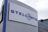 FILE - The Stellantis sign is seen outside the Chrysler Technology Center, Jan. 19, 2021, in Auburn Hills, Mich. Stellantis on Wednesday, April 26, 2023, said it is offering buyouts to groups of white-collar and unionized employees in the U.S., as well as hourly workers in Canada. (AP Photo/Carlos Osorio, File)