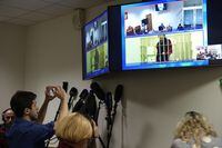 WNBA star and two-time Olympic gold medalist Brittney Griner is seen on the bottom part of a TV screen as she appears in a video link provided by the Russian Federal Penitentiary Service a courtroom prior to a hearing at the Moscow Regional Court in Moscow, Russia, Tuesday, Oct. 25, 2022. A Russian court has started hearing American basketball star Brittney Griner’s appeal against her nine-year prison sentence for drug possession (AP Photo/Alexander Zemlianichenko)