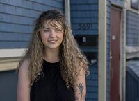 Gina Grattan stands near her apartment in Halifax on Tuesday, May 24, 2022. Grattan is part of a growing cohort of young people struggling with the affordability of living in the city as rental costs soar. THE CANADIAN PRESS/Andrew Vaughan