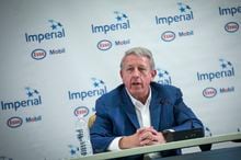 Imperial Oil President and CEO Brad Corson answers questions at a news conference, as he is taking over from outgoing President and CEO Rich Kruger in Calgary, Wednesday, Dec. 4, 2019. THE CANADIAN PRESS/Todd Korol