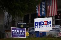 Yard signs for both President Donald Trump and Democratic presidential candidate Joe Biden are seen in front of a house in Dickson City, Pa., on Sept. 25, 2020.
