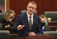 Alberta Finance Minister Travis Toews delivers the 2021-22 budget in Edmonton on Feb. 25, 2021. Alberta is introducing rules that would make it easier for entrepreneurs to test products in the emerging field of cryptocurrencies and online banking. THE CANADIAN PRESS/Jason Franson