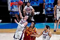 Mar 30, 2021; Indianapolis, IN, USA; Gonzaga Bulldogs forward Corey Kispert (24) shoots the ball against USC Trojans forward Evan Mobley (4) during the second half in the Elite Eight of the 2021 NCAA Tournament at Lucas Oil Stadium. Mandatory Credit: Robert Deutsch-USA TODAY Sports