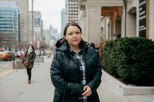 Camille Leahy stands outside Princess Margaret Hospital after an appointment in Toronto, Thursday, February 16, 2023. (Galit Rodan/The Globe and Mail)