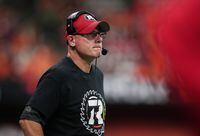 Ottawa Redblacks head coach Paul LaPolice watches from the sideline during the second half of a CFL football game against the B.C. Lions in Vancouver, on Friday, September 30, 2022. THE CANADIAN PRESS/Darryl Dyck