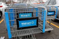 FILE PHOTO: Walmart shopping carts are seen on the parking lot ahead of the Thanksgiving holiday in Chicago, Illinois, U.S. November 27, 2019. REUTERS/Kamil Krzaczynski/File Photo