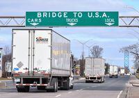 Transport trucks approach the Canada/USA border crossing in Windsor, Ont. on Saturday, March 21, 2020. North American trade is facing a "critical moment" in the ongoing aftermath of the COVID-19 pandemic, say Canadian business leaders as they embark on a concerted campaign to fortify ties with the United States. THE CANADIAN PRESS/Rob Gurdebeke