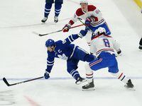 May 20, 2021; Toronto, Ontario, CAN; Toronto Maple Leafs forward John Tavares (91) is hit by Montreal Canadiens defenseman Ben Chiarot (8) during the first period of game one of the first round of the 2021 Stanley Cup Playoffs at Scotiabank Arena. Mandatory Credit: John E. Sokolowski-USA TODAY Sports