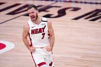Miami Heat guard Goran Dragic (7) celebrates after sinking a basket against the Boston Celtics during the second half of an NBA conference final playoff basketball game, Thursday, Sept. 17, 2020, in Lake Buena Vista, Fla.