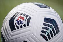 A soccer ball sits by the pitch line prior to the NWSL Championship soccer match between the Washington Spirit and Chicago Red Stars Saturday, Nov. 20, 2021, in Louisville, Kentucky. (AP Photo/Jeff Dean)