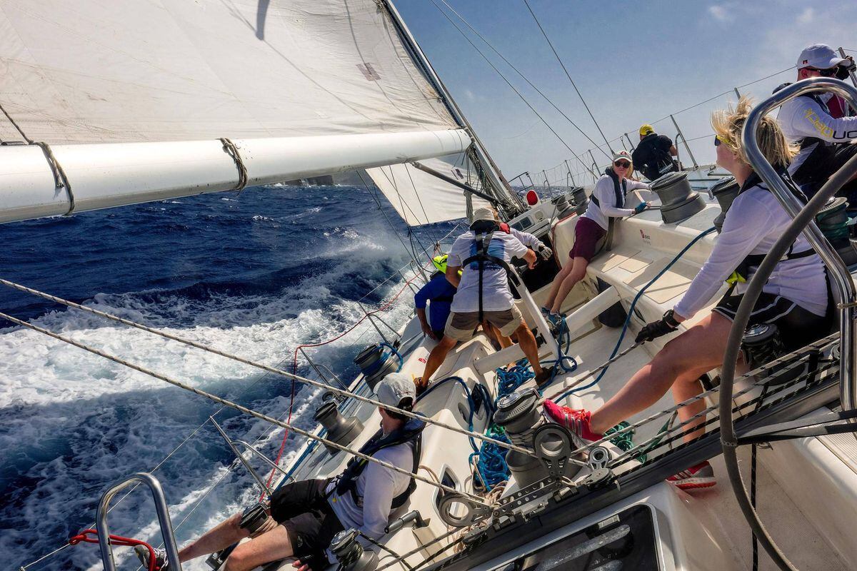 Sailing the Antigua seas on an ocean-racing yacht.