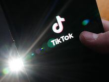 The TikTok startup page is displayed on an iPhone in Ottawa on Monday, Feb. 27, 2023. TikTok has been in the spotlight this week after the federal government announced it was banning the social media app from its devices days after Canadian privacy commissioners began investigating the company. THE CANADIAN PRESS/Sean Kilpatrick