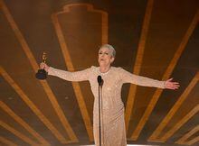 US actress Jamie Lee Curtis accepts the Oscar for Best Actress in a Supporting Role for "Everything Everywhere All at Once" onstage during the 95th Annual Academy Awards at the Dolby Theatre in Hollywood, California on March 12, 2023. (Photo by Patrick T. Fallon / AFP) (Photo by PATRICK T. FALLON/AFP via Getty Images)