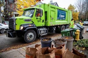 A truck from Canadian waste management company GFL Environmental Inc. makes its rounds through a neighbourhood in Toronto in November of 2019.