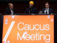 Brian Masse and Peter Julian look on as NDP leader Jagmeet Singh speaks at the start of a two day caucus meeting in Ottawa, Wednesday, Jan. 22, 2020. A debate over the definition of anti-Semitism that has divided the Jewish community has spilled over to the NDP ahead of the party convention next month. THE CANADIAN PRESS/Adrian Wyld