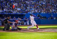 TORONTO, ONTARIO - SEPTEMBER 18: Teoscar Hernandez #37 of the Toronto Blue Jays hits a three run home run against the Minnesota Twins in the fourth inning during their MLB game at the Rogers Centre on September 18, 2021 in Toronto, Ontario, Canada. (Photo by Mark Blinch/Getty Images)