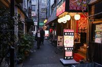 A street scene in the Kanda district in Tokyo, Japan, Dec. 16, 2021. The country’s prime minister says lifting long-stagnant wages would jump-start the sputtering economy. Companies call the plan a nonstarter. (Niroko Hayashi/The New York Times) 