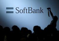 FILE PHOTO: FILE PHOTO: The logo of SoftBank Group Corp is displayed at SoftBank World 2017 conference in Tokyo, Japan, July 20, 2017. REUTERS/Issei Kato/File Photo