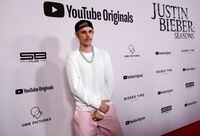 FILE PHOTO: Singer Justin Bieber poses at the premiere for the documentary television series "Justin Bieber: Seasons" in Los Angeles, California, U.S., January 27, 2020. REUTERS/Mario Anzuoni/File Photo