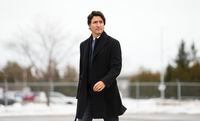 Prime Minister Justin Trudeau departs for Nassau, Bahamas, from Ottawa on Wednesday, Feb. 15, 2023. Trudeau is playing down a report that China tried to sway the last federal election, saying Canadian voters alone decided the outcome.THE CANADIAN PRESS/Sean Kilpatrick