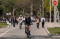 People walk on the West Rd. in High Park on Thursday, April 27, 2023. Tuan Minh Nguyen/ The Globe and Mail