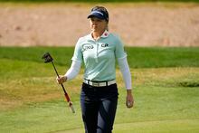 Brooke Henderson walks off the seventh green during the first round of the Drive On Championship golf tournament, Thursday, March 23, 2023, in Gold Canyon, Ariz. (AP Photo/Matt York)