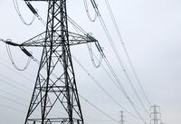 FILE PHOTO: Electricity pylons are seen in Wellingborough, Britain, March 30, 2022. REUTERS/Andrew Boyers/File Photo