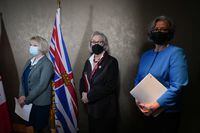 B.C. Provincial Health Officer Dr. Bonnie Henry, from left to right, Carolyn Bennett, federal minister of Mental Health and Addictions, and B.C. Minister of Mental Health and Addictions Jennifer Whiteside stand together during a news conference in Vancouver, on Monday, January 30, 2023. Decriminalization of people with small amounts of illegal drugs for their own use has become a reality in British Columbia, but substance users and researchers say the move is expected to make little immediate difference because of a toxic drug supply that is killing people. THE CANADIAN PRESS/Darryl Dyck