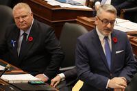 Ontario Premier Doug Ford, left, looks over at Minister of Municipal Affairs and Housing, Paul Calandra, at Queen's Park, in Toronto, Monday, Oct. 30, 2023. THE CANADIAN PRESS/Chris Young