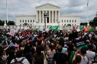 Thousands of abortion-rights activists gather in front of the U.S. Supreme Court after the Court announced a ruling in the Dobbs v. Jackson Women's Health Organization case on June 24. The Court's decision overturns the landmark 50-year-old Roe v. Wade case and erases a federal right to an abortion. 