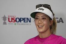 FILE - Michelle Wie West speaks during a news conference after a practice round for the U.S. Women's Open golf tournament at the Pine Needles Lodge & Golf Club in Southern Pines, N.C. on Tuesday, May 31, 2022. Wie West has launched a video series in which she speaks to female athletes and their business investments. (AP Photo/Chris Carlson, File)