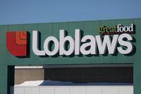 FILE PHOTO: A Loblaw logo is seen outside a grocery store in Ottawa, Ontario, Canada, February 14, 2019. REUTERS/Chris Wattie/File Photo