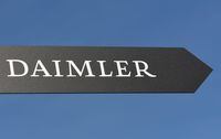 FILE PHOTO: Daimler AG sign is pictured at the IAA truck show in Hanover, Germany, September 22, 2016.  REUTERS/Fabian Bimmer