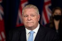 Ontario Premier Doug Ford attends a news conference at the Queens Park Legislature, in Toronto, on Friday, February 11, 2022. Ford says he is declaring a state of emergency in response to ongoing blockades in Ottawa and Windsor, Ont. THE CANADIAN PRESS/Chris Young