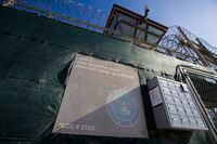 FILE - In this photo reviewed by U.S. military officials, a detainee, the control tower of Camp VI detention facility is seen April 17, 2019, in Guantanamo Bay Naval Base, Cuba. The U.S. has transferred Guantanamo detainee Said bin Brahim bin Umran Bakush back to his home country of Algeria citing that his continued detention was no longer necessary, the Department of Defense announced Thursday, April 20, 2023. (AP Photo/Alex Brandon, File)