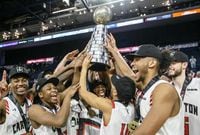 Members of the Carleton Ravens celebrate winning the USports men's basketball national championship over the University of Calgary Dinos in Halifax on March 10, 2019. Canada's best university basketball players won't just be playing for pride and glory in their championship tournament in Ottawa this weekend. Organizers say they are playing a part in history. For the first time ever the men's and women's championships are being held in the same venue at the same time, jointly hosted by the University of Ottawa, Carleton University and the Ottawa Sports and Entertainment Group. THE CANADIAN PRESS/Darren Calabrese
