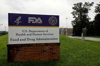 FILE PHOTO: Signage is seen outside of the Food and Drug Administration (FDA) headquarters in White Oak, Maryland, U.S., August 29, 2020. REUTERS/Andrew Kelly/File Photo