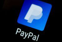 FILE PHOTO: FILE PHOTO: The PayPal app logo seen on a mobile phone in this illustration photo October 16, 2017. REUTERS/Thomas White/File Photo/File Photo