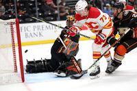 ANAHEIM, CALIFORNIA - APRIL 06: Tyler Toffoli #73 of the Calgary Flames scores a goal past the defense of Anthony Stolarz #41 of the Anaheim Ducks during the second period of a game at Honda Center on April 06, 2022 in Anaheim, California. (Photo by Sean M. Haffey/Getty Images)