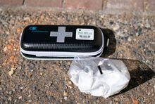 A program that is the first of its kind in Canada aims to help British Columbians living with mild to moderate overdose-related brain injuries. The Cognitive Assessment and Rehabilitation for Substance Use program provides specialized supports for people who use substances including opioids and alcohol. A used naloxone kit is seen on the sidewalk as paramedics respond to a drug overdose in downtown Vancouver on June 23, 2021. THE CANADIAN PRESS/Jonathan Hayward