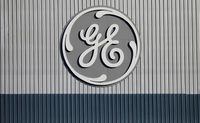 FILE PHOTO: The logo of U.S. conglomerate General Electric is pictured at the site of the company's energy branch in Belfort, France, February 5, 2019. REUTERS/Vincent Kessler