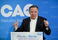 Quebec Premier and Coalition Avenir Quebec leader Francois Legault speaks at the nomination meeting of Martine Biron, candidate at the Chutes-de-la-Chaudiere riding for the CAQ, Wednesday, August 10, 2022  in Levis, Que. THE CANADIAN PRESS/Jacques Boissinot