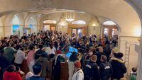 Dozens of protesters fill the entrance to the Saskatchewan legislature in Regnia calling for a ceasefire, in a still frame taken from video made on Monday, Nov. 20, 2023. THE CANADIAN PRESS/Jeremy Simes