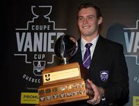 Western University Mustangs quarterback Chris Merchant wins the Hec Crighton trophy awarded to the most outstanding Canadian football player, at the U Sports award banquet as part of the Vanier Cup celebrations in Quebec City, Thursday, Nov. 21, 2019.