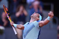 MADRID, SPAIN - MAY 05: Rafael Nadal of Spain celebrates victory in their round of 16 match against David Goffin of Belgium during day eight of Mutua Madrid Open at La Caja Magica on May 05, 2022 in Madrid, Spain. (Photo by Denis Doyle/Getty Images)MADRID, SPAIN - MAY 05:  in his second round match during day seven of the Mutua Madrid Open at La Caja Magica on May 04, 2022 in Madrid, Spain.  (Photo by Denis Doyle/Getty Images)